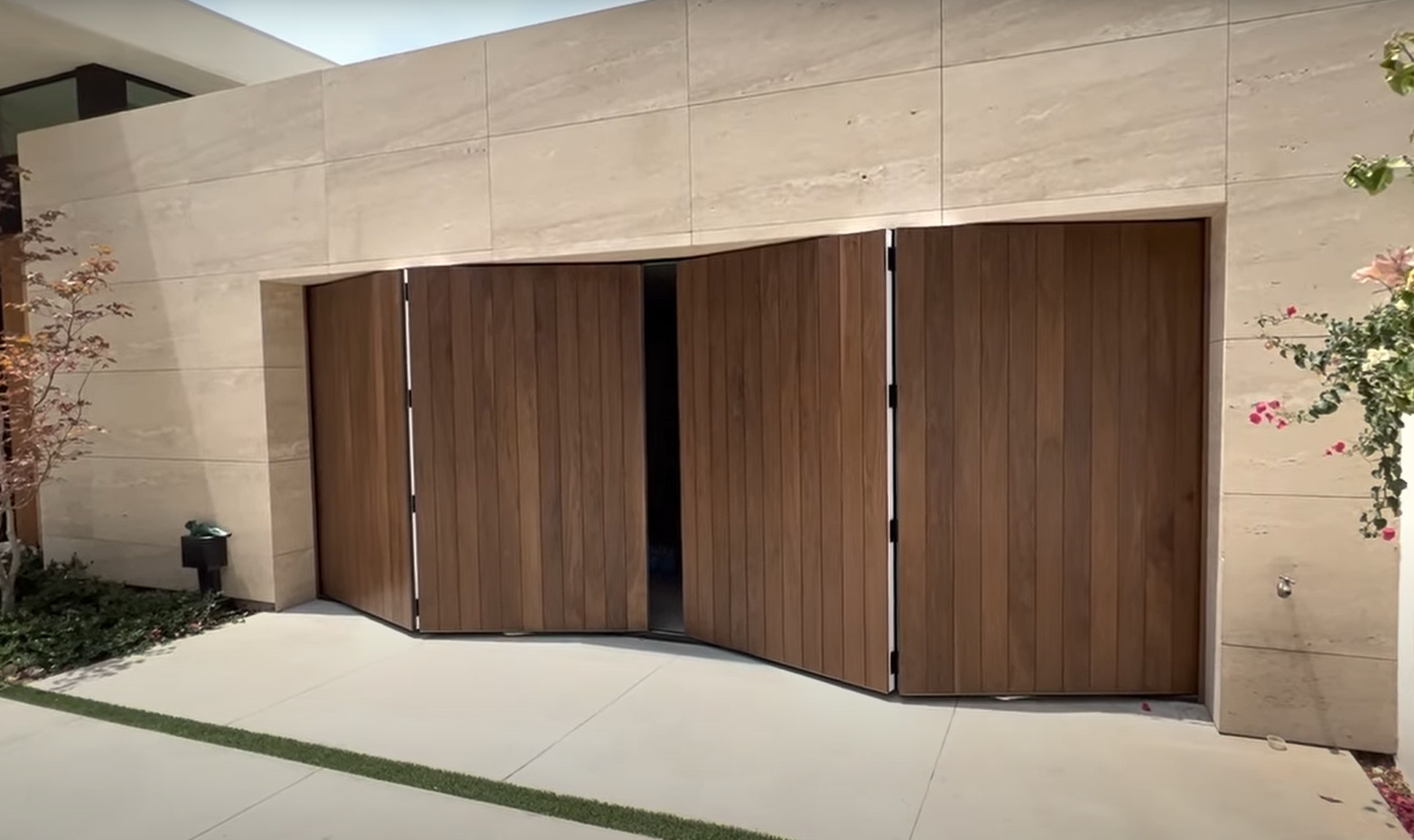 modern custom garage door being installed by professional